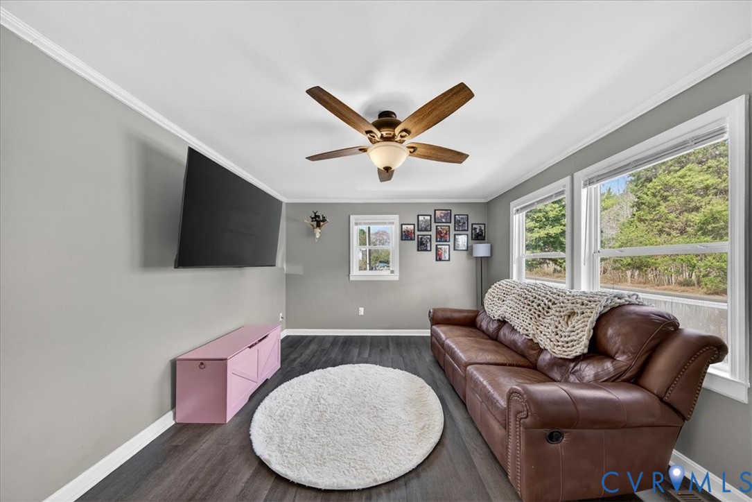8427 Pamunkey Road Spotsylvania, VA 22551 - Photo 9 of 50 a living room with furniture and a flat screen tv