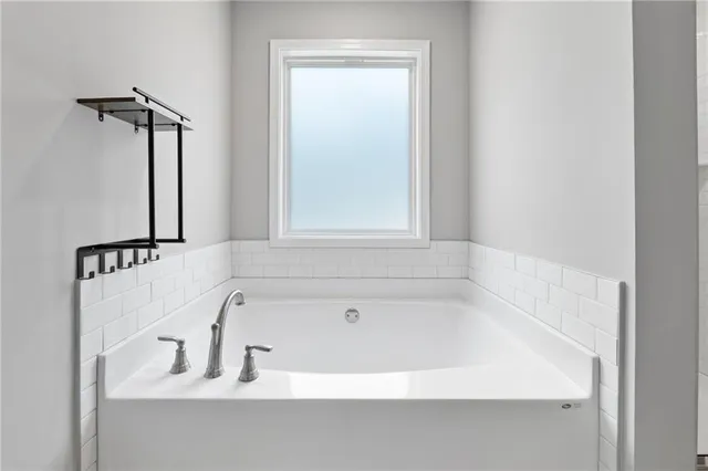 a bathroom with a bathtub