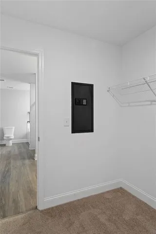 a view of a livingroom with wooden floor