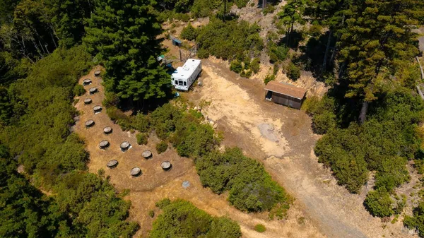 an aerial view of residential house with outdoor space