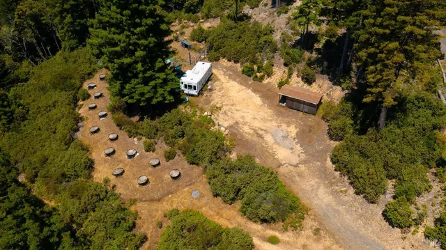 an aerial view of residential house with outdoor space
