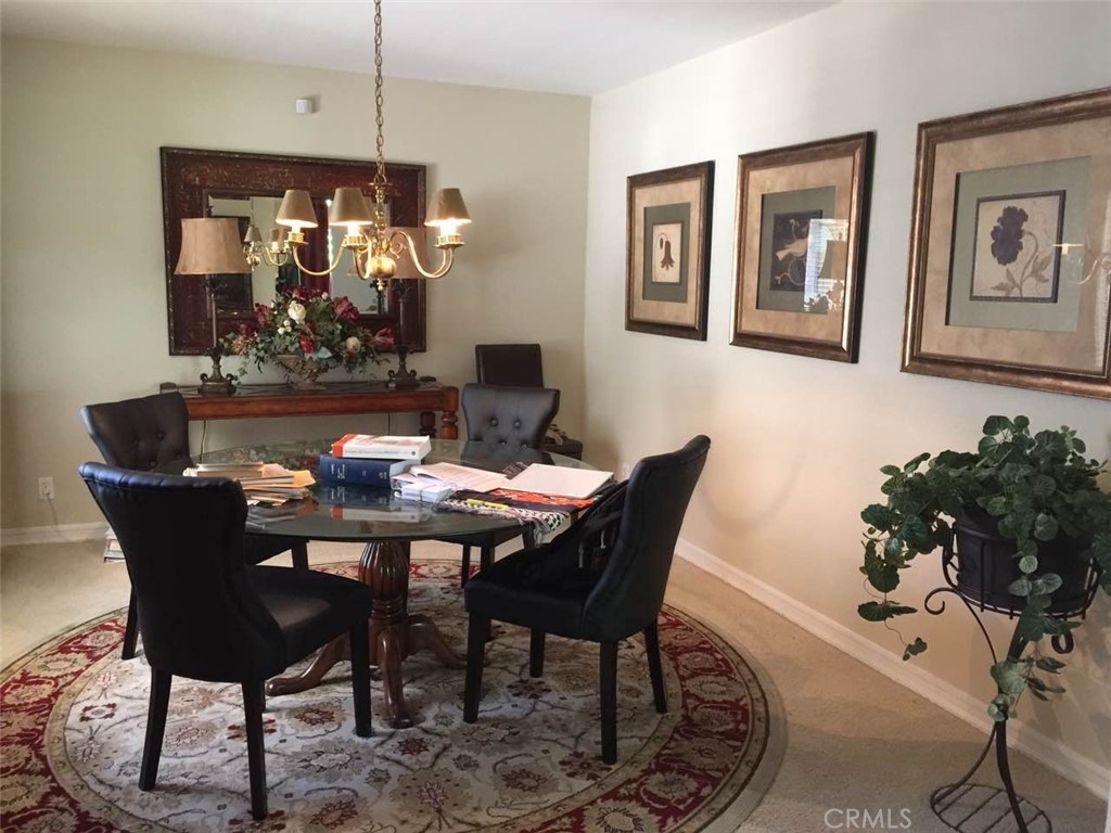 2725 Firethorne Avenue Fullerton, CA 92835 - Photo 2 of 9 a dining room with furniture and window