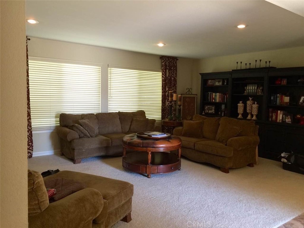 2725 Firethorne Avenue Fullerton, CA 92835 - Photo 3 of 9 a living room with a couch and a window