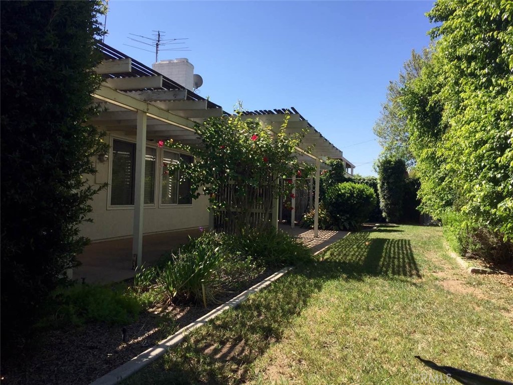 2725 Firethorne Avenue Fullerton, CA 92835 - Photo 5 of 9 a view of patio with table and chairs and potted plants