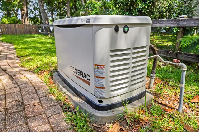 a kitchen with stainless steel appliances granite countertop a refrigerator and a stove