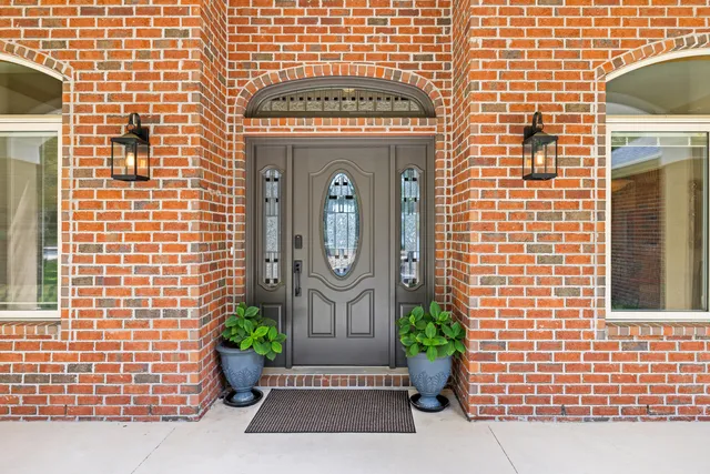 a view of a livingroom with furniture and windows