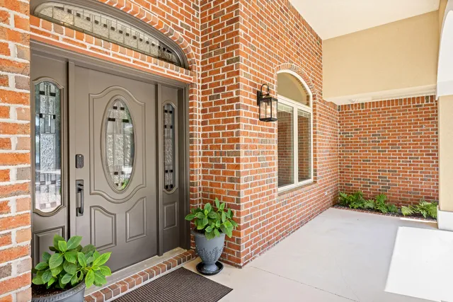 a view of a hallway with entryway dining table and chairs