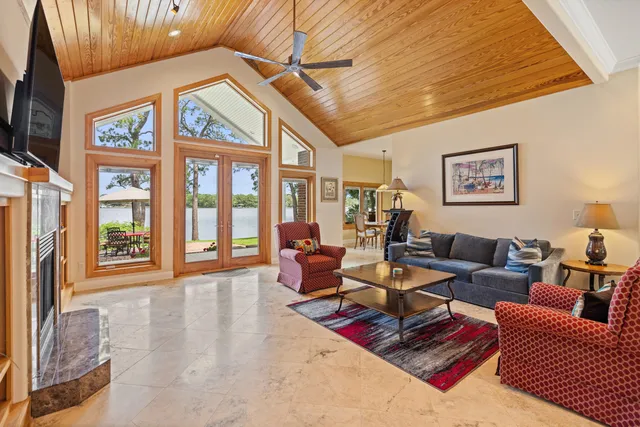 a bedroom with a large bed and a couch