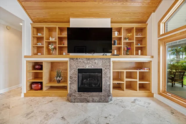 a bedroom with a bed dresser and a couch