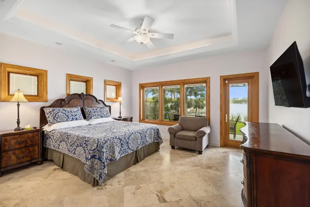 a bedroom with a bed and cabinets