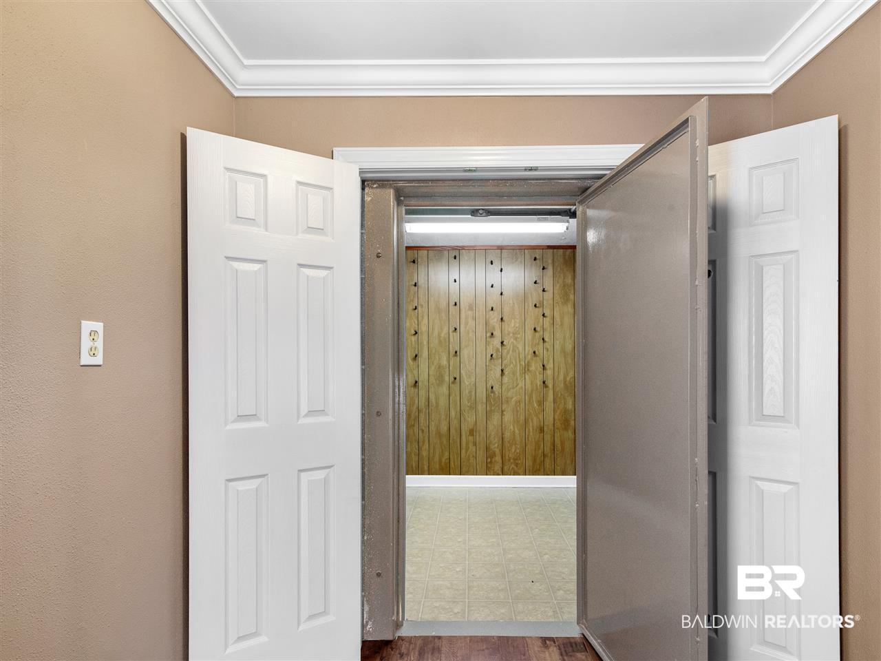 802 Artillery Range Street Daphne, AL 36527 - Photo 13 of 32 Enter 7x7 office to access 7x8 safe/safe room