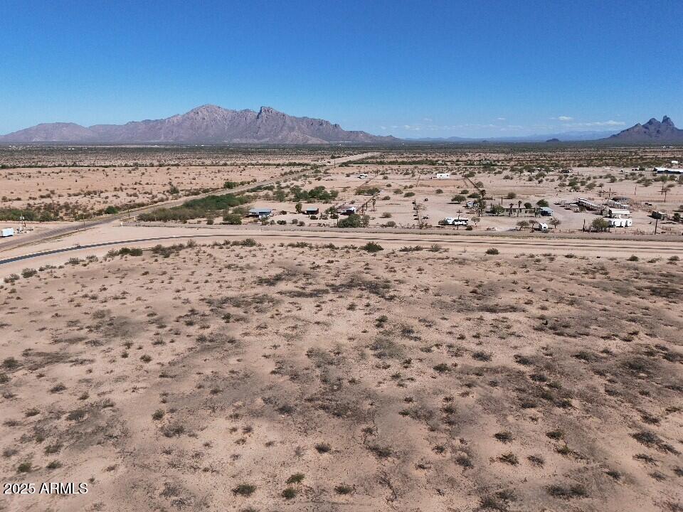 0 West Harmon Road Eloy, AZ 85131 - Photo 21 of 34 a view of an ocean beach and mountain