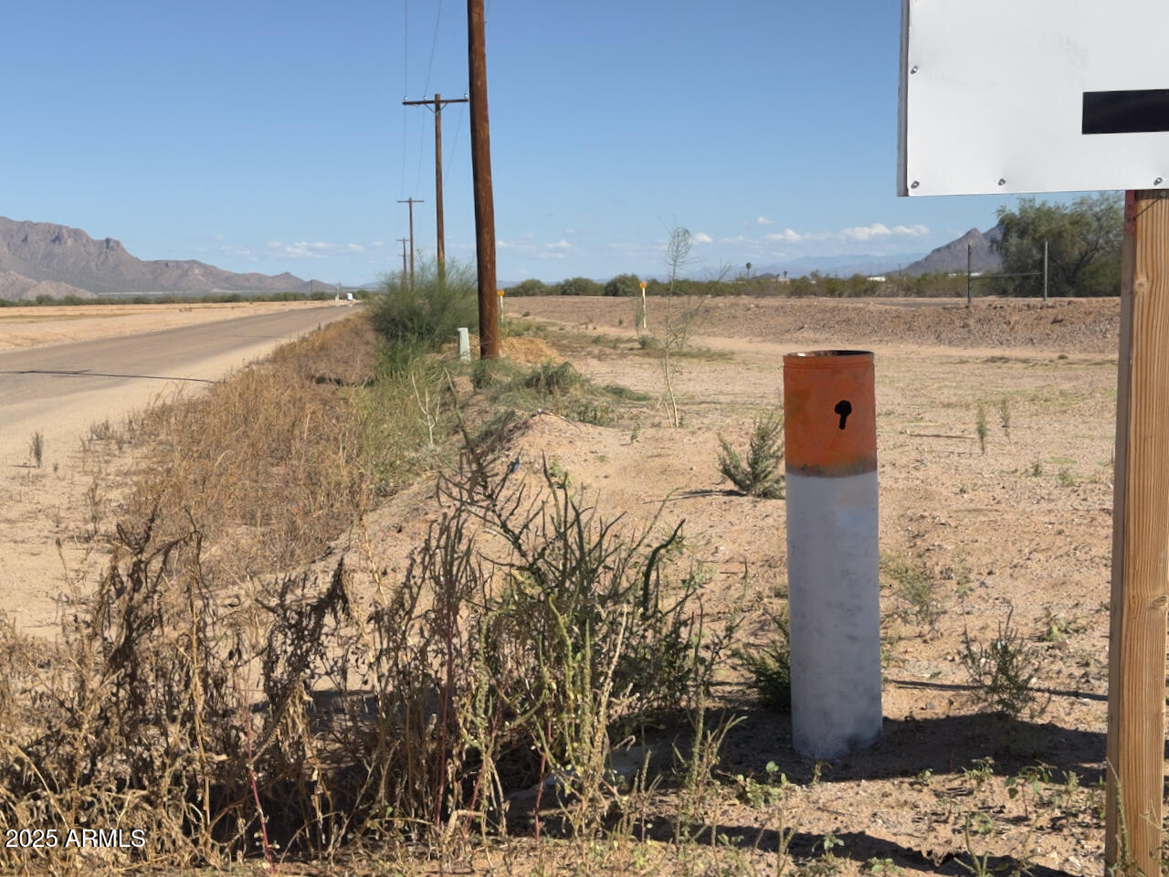 0 West Harmon Road Eloy, AZ 85131 - Photo 7 of 34 a view of a water with a building in the background