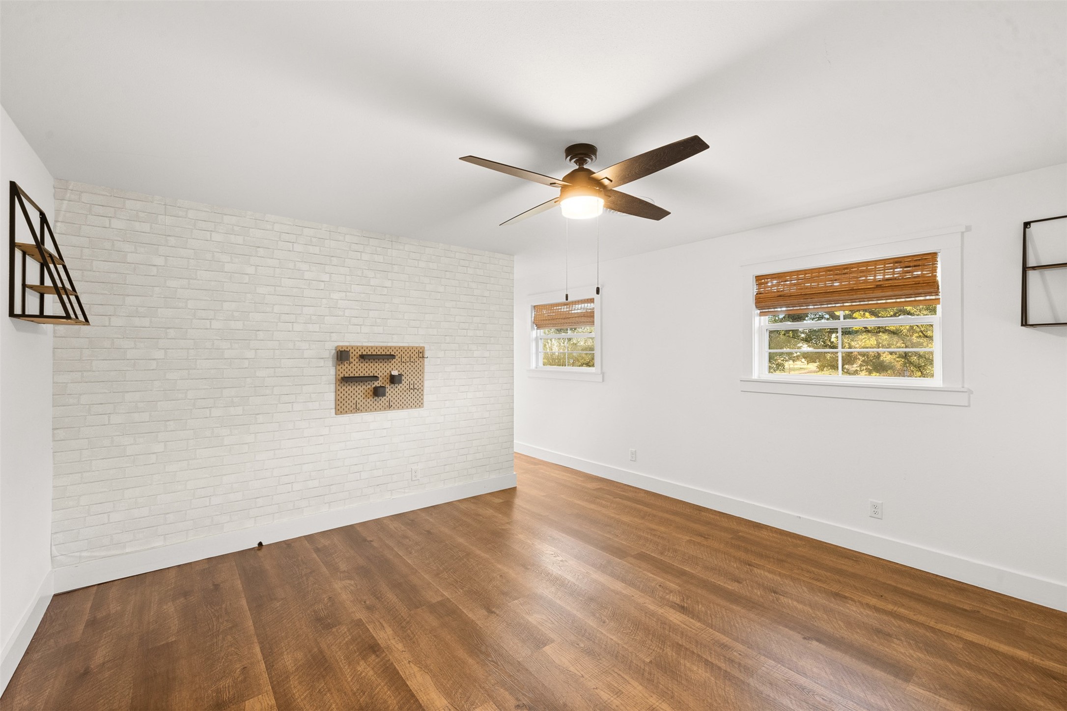 351 Pleasant Hill School Road Brenham, TX 77833 - Photo 16 of 46 a view of empty room with wooden floor