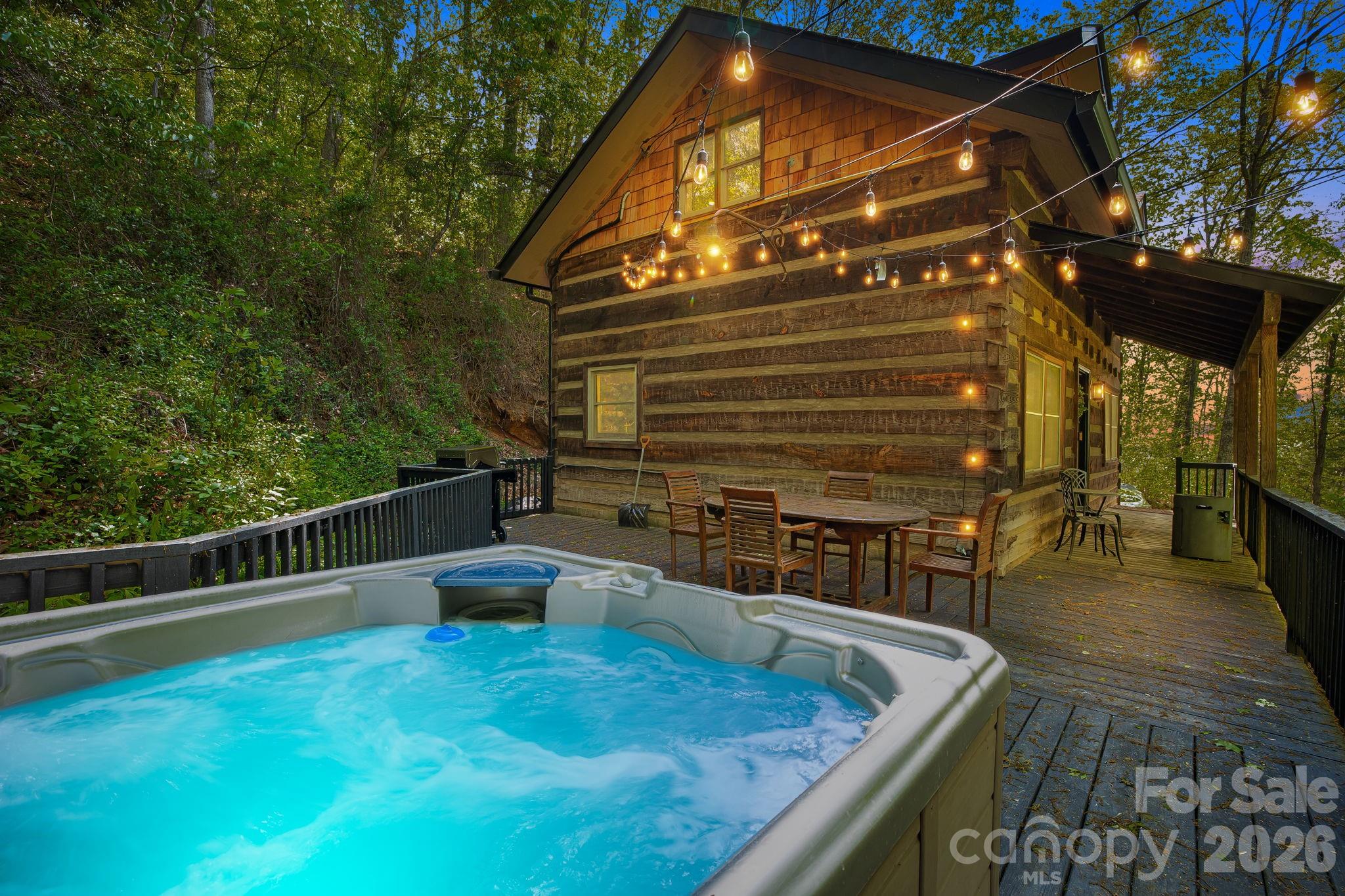 155 Spivey Mountain Road Asheville, NC 28806 - Photo 1 of 48 a view of a balcony with chairs