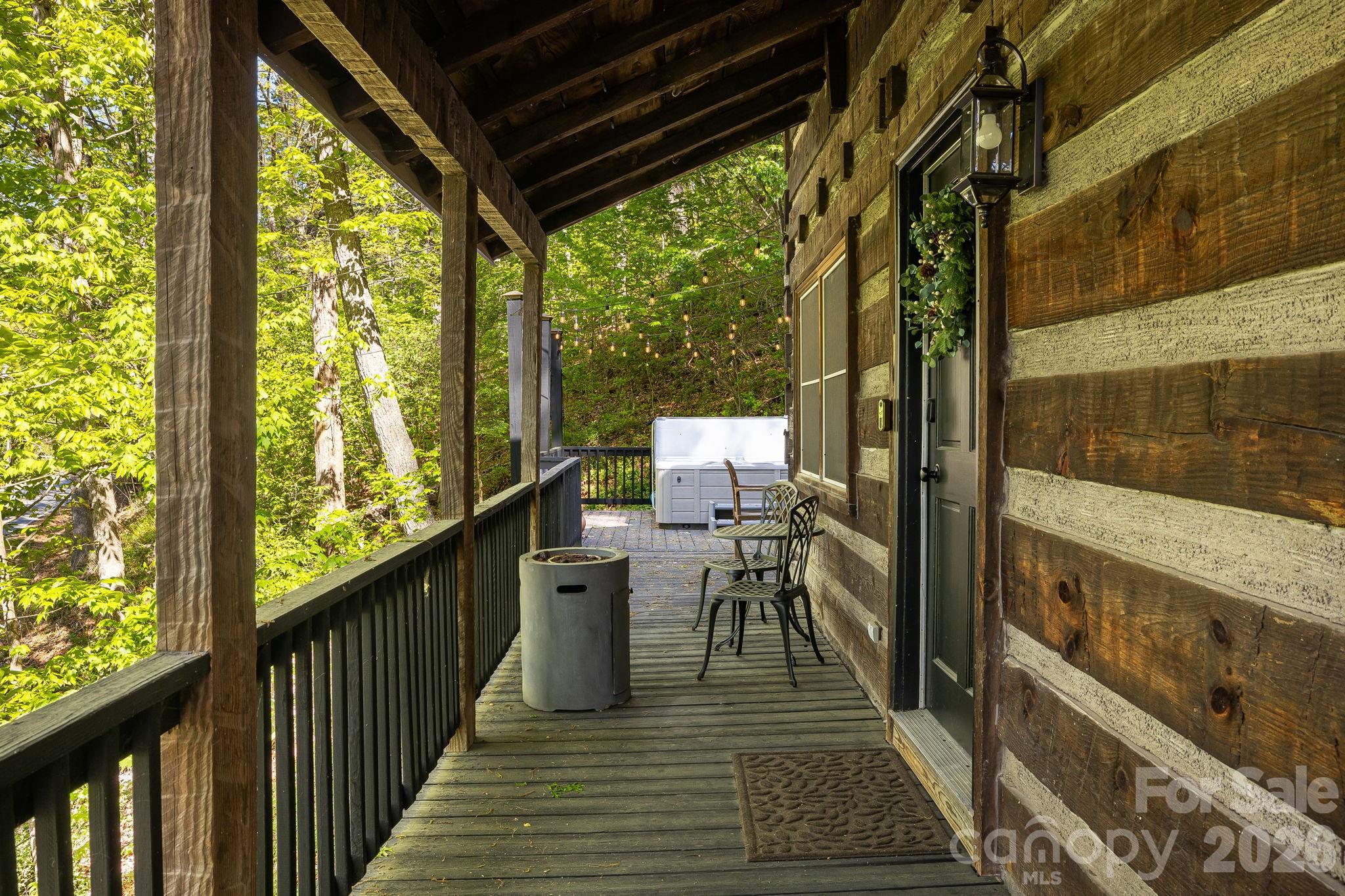 155 Spivey Mountain Road Asheville, NC 28806 - Photo 34 of 48 a view of a balcony with chairs
