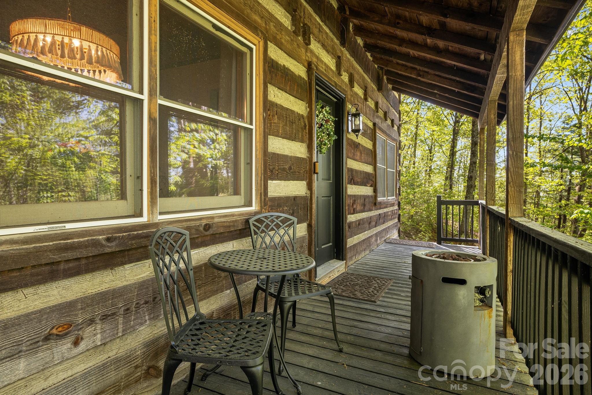 155 Spivey Mountain Road Asheville, NC 28806 - Photo 35 of 48 a view of a porch with furniture