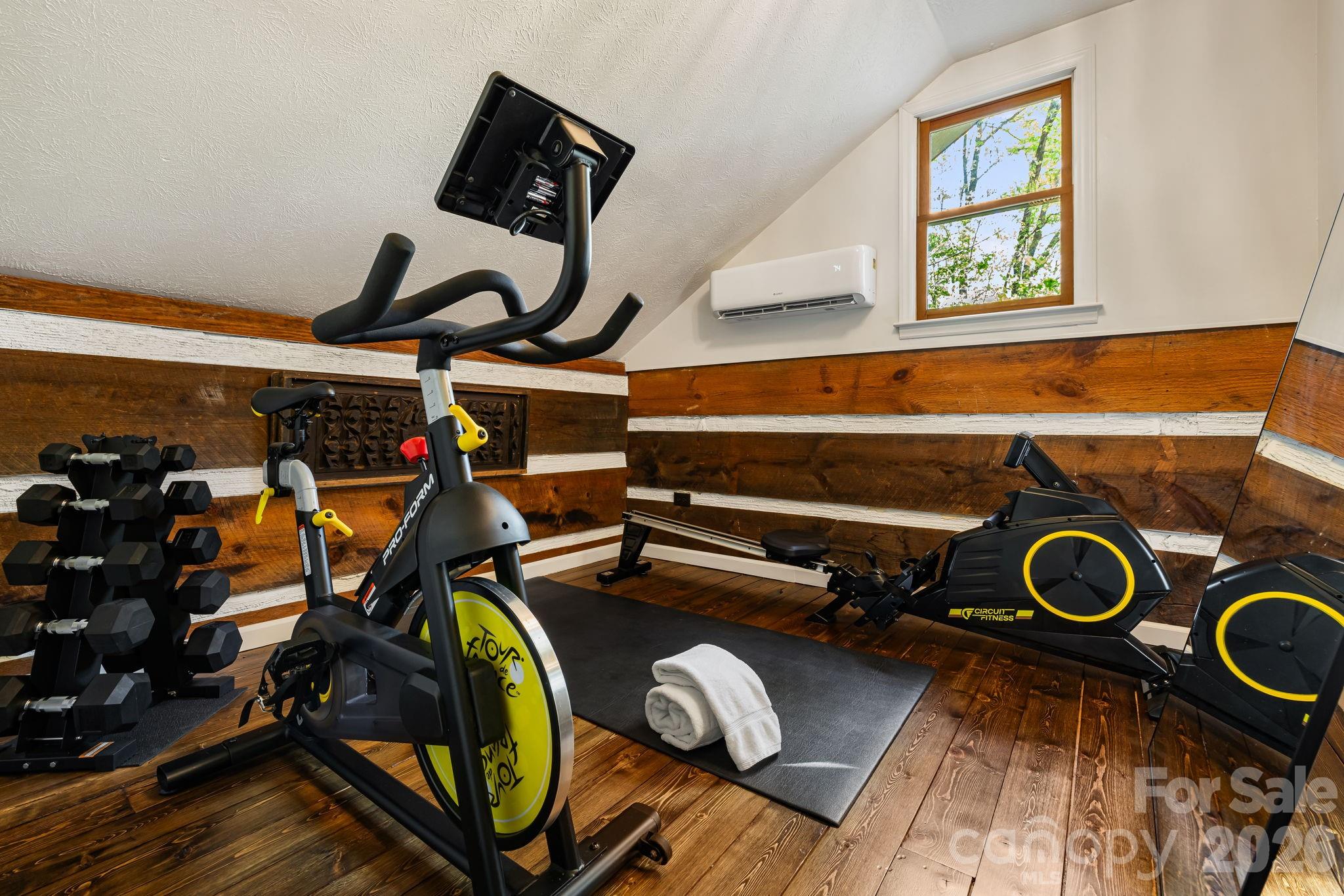 155 Spivey Mountain Road Asheville, NC 28806 - Photo 9 of 48 a view of a room with gym equipment