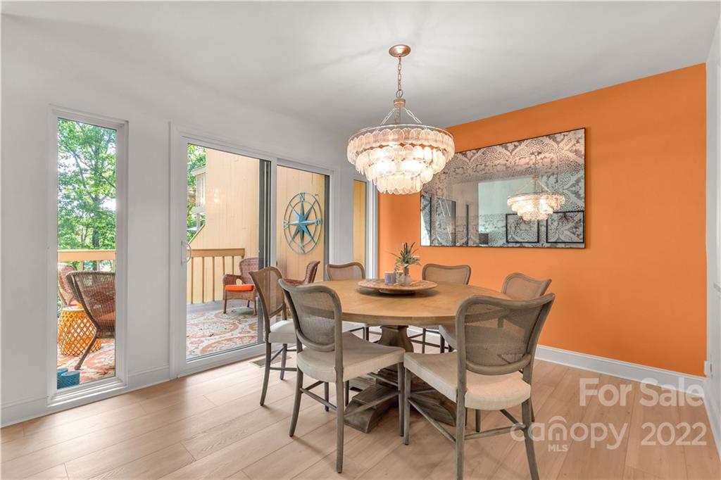 62 Ridgeport Road Clover, SC 29710 - Photo 7 of 41 a view of a dining room with furniture wooden floor and chandelier
