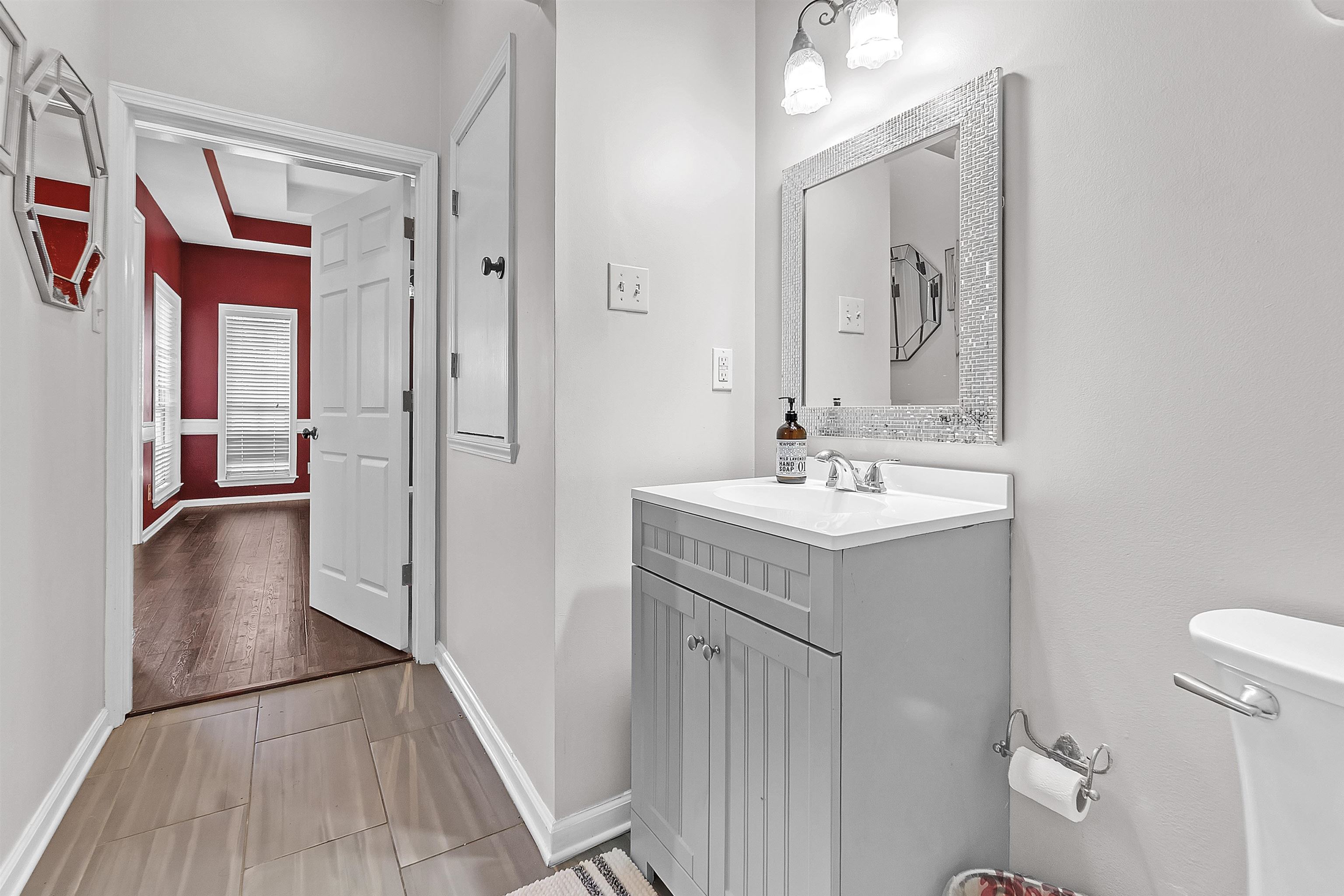 4366 Campground Road Munford, TN 38058 - Photo 6 of 40 Half bathroom by the entry featuring vanity and light tile patterned floors