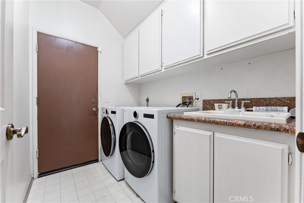 13776 Monteverde Drive Chino Hills, CA 91709 - Photo 13 of 14 a utility room with sink dryer and washer