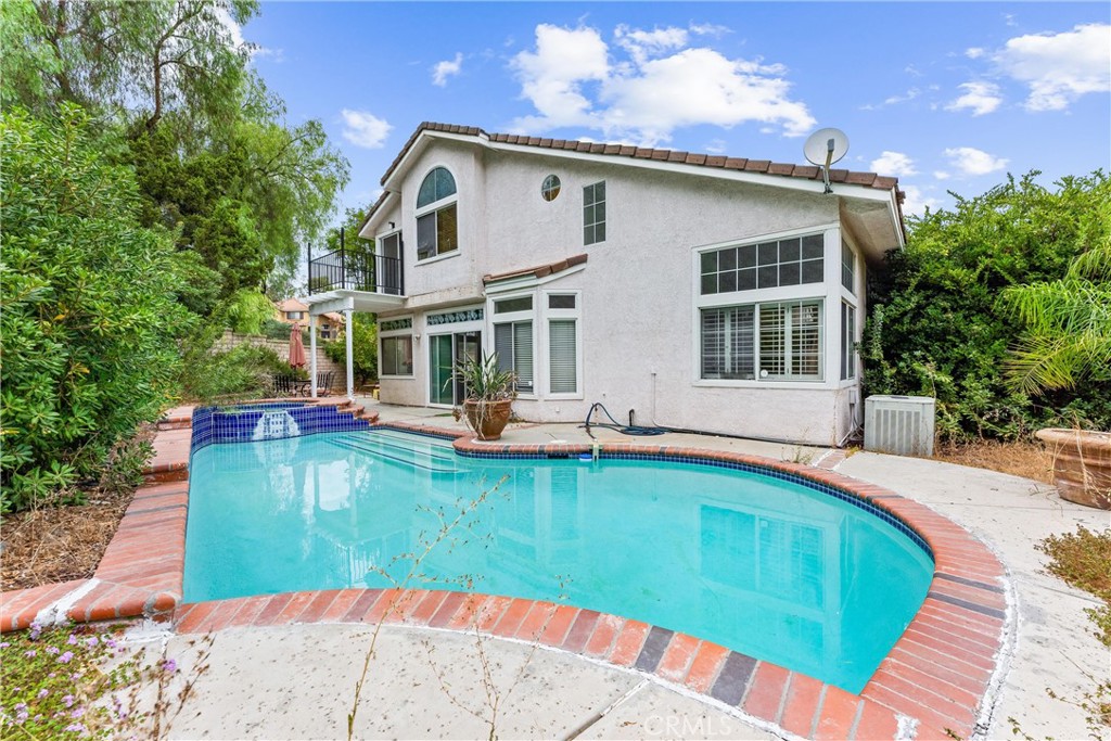 13776 Monteverde Drive Chino Hills, CA 91709 - Photo 14 of 14 a swimming pool with outdoor seating