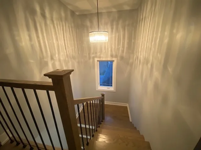 a view of a hallway with windows