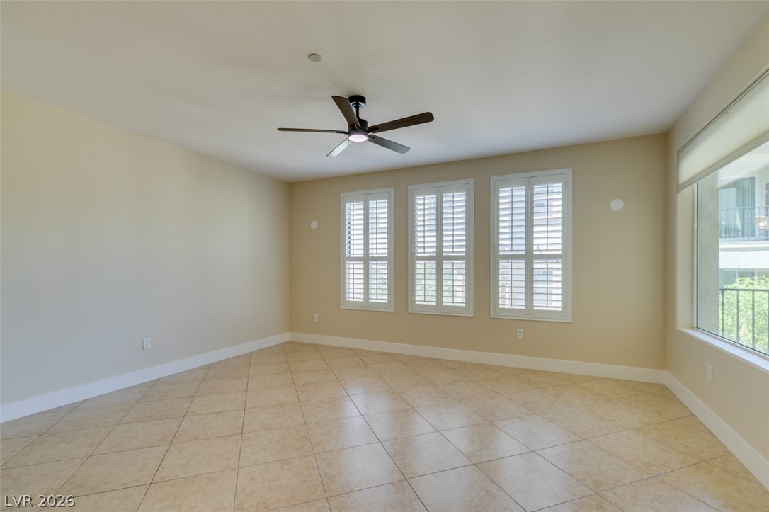2555 Hampton Road, Unit 3203 Henderson, NV 89052 - Photo 10 of 43 Tiled flooring and plantation shutters define this versatile living space.