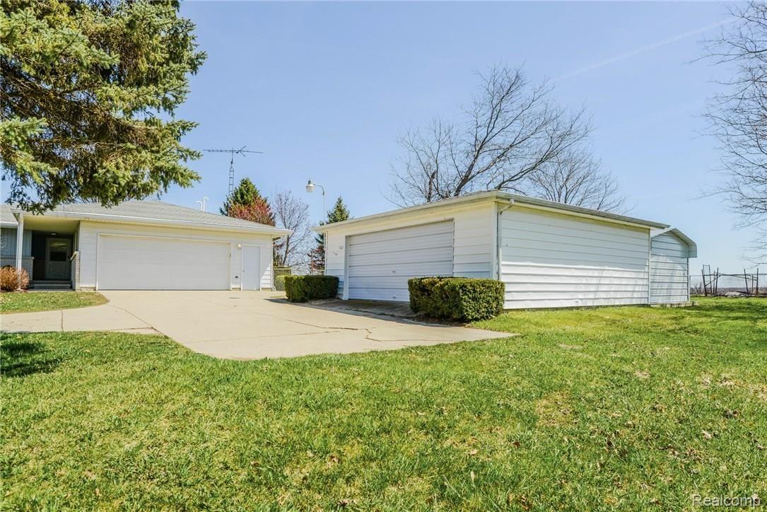 5821 West Hayner Road Fowlerville, MI 48836 - Photo 4 of 21 2 car attached garage and and 2nd 2 car garage/workshop