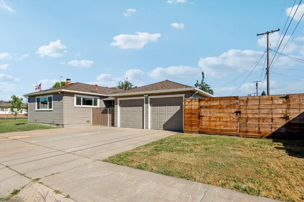 a front view of a house with a garage