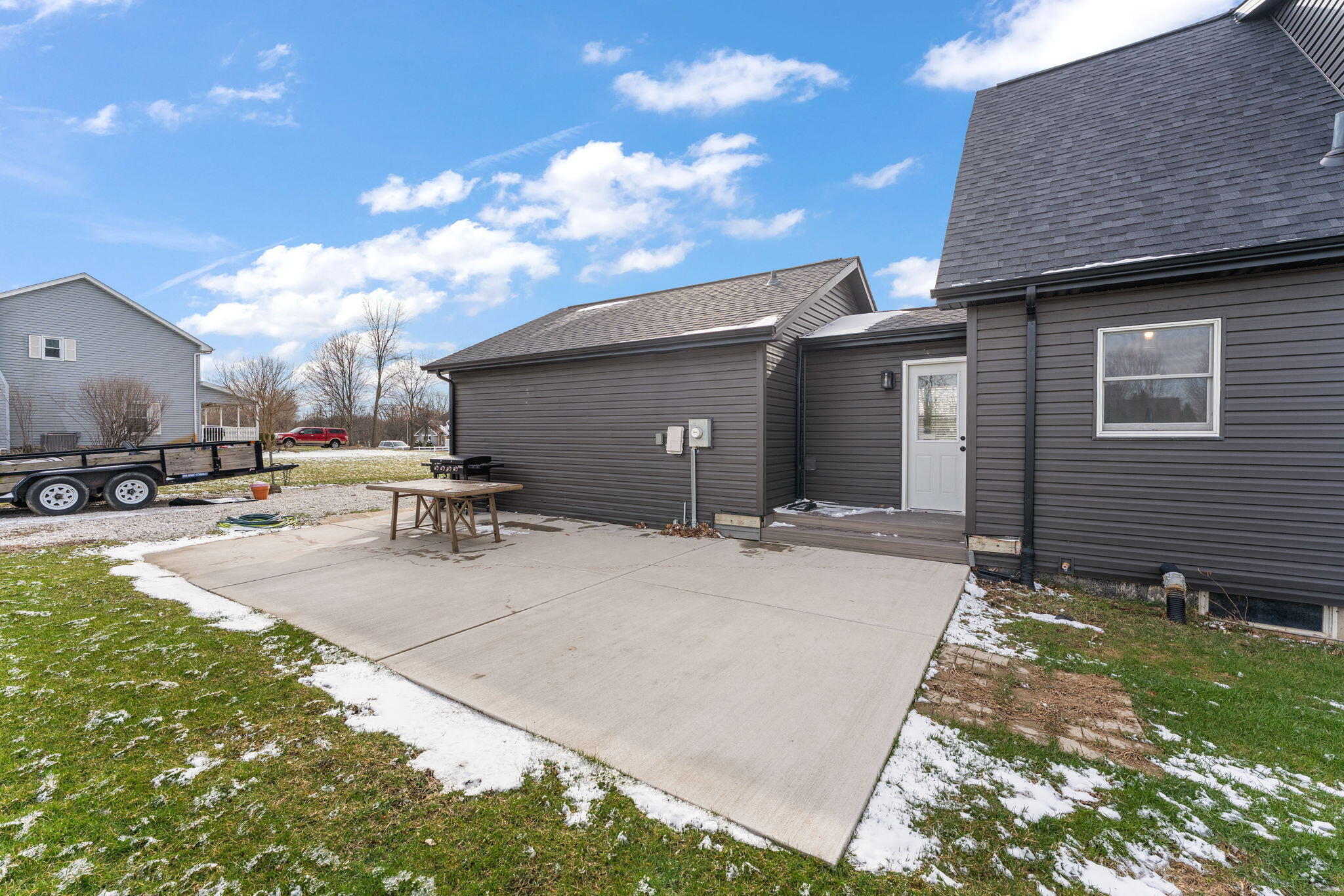 897 Jane Avenue Chesterton, IN 46304 - Photo 34 of 40 a view of a house with a patio
