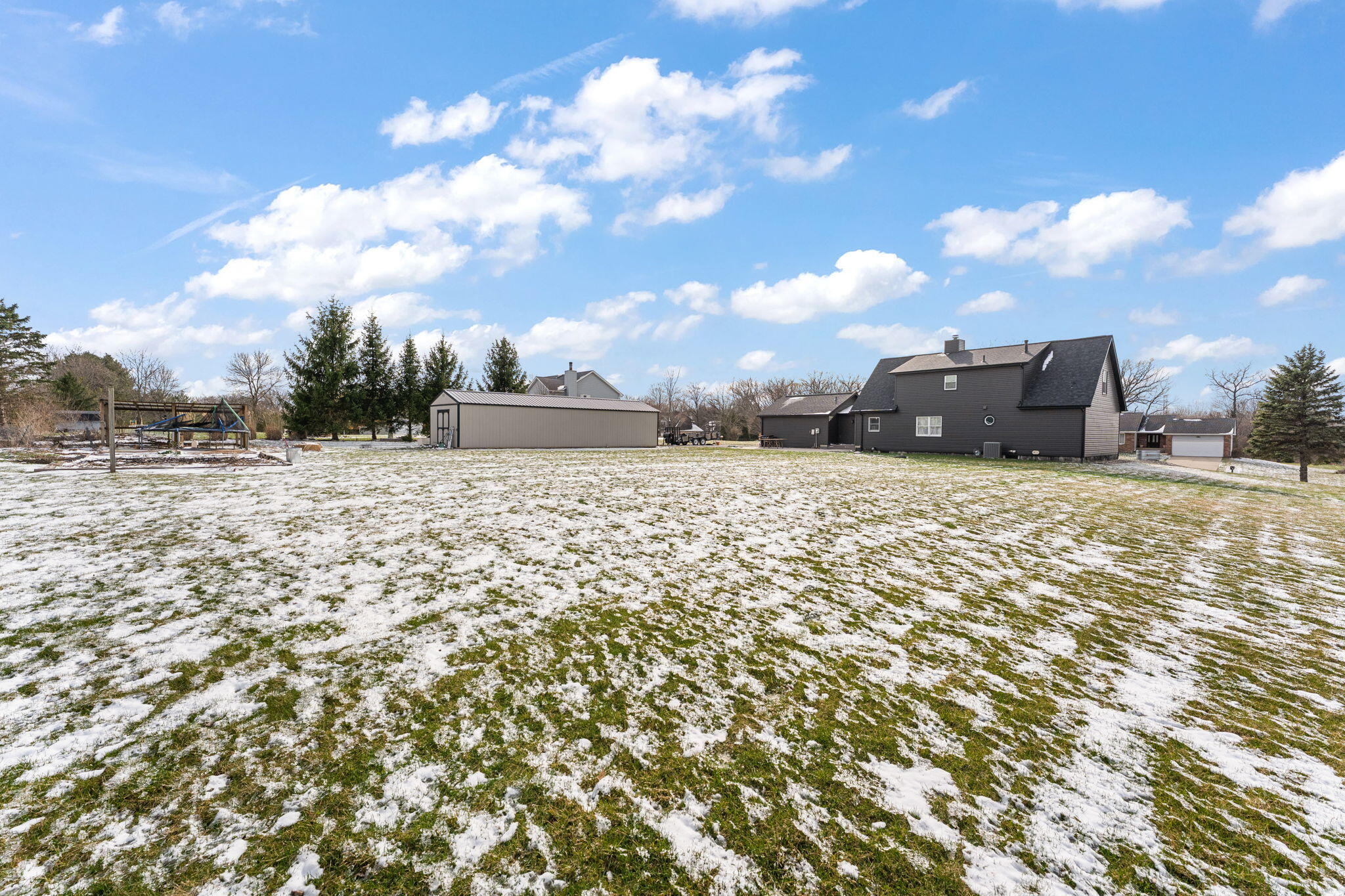 897 Jane Avenue Chesterton, IN 46304 - Photo 35 of 40 a view of a dry yard with wooden fence