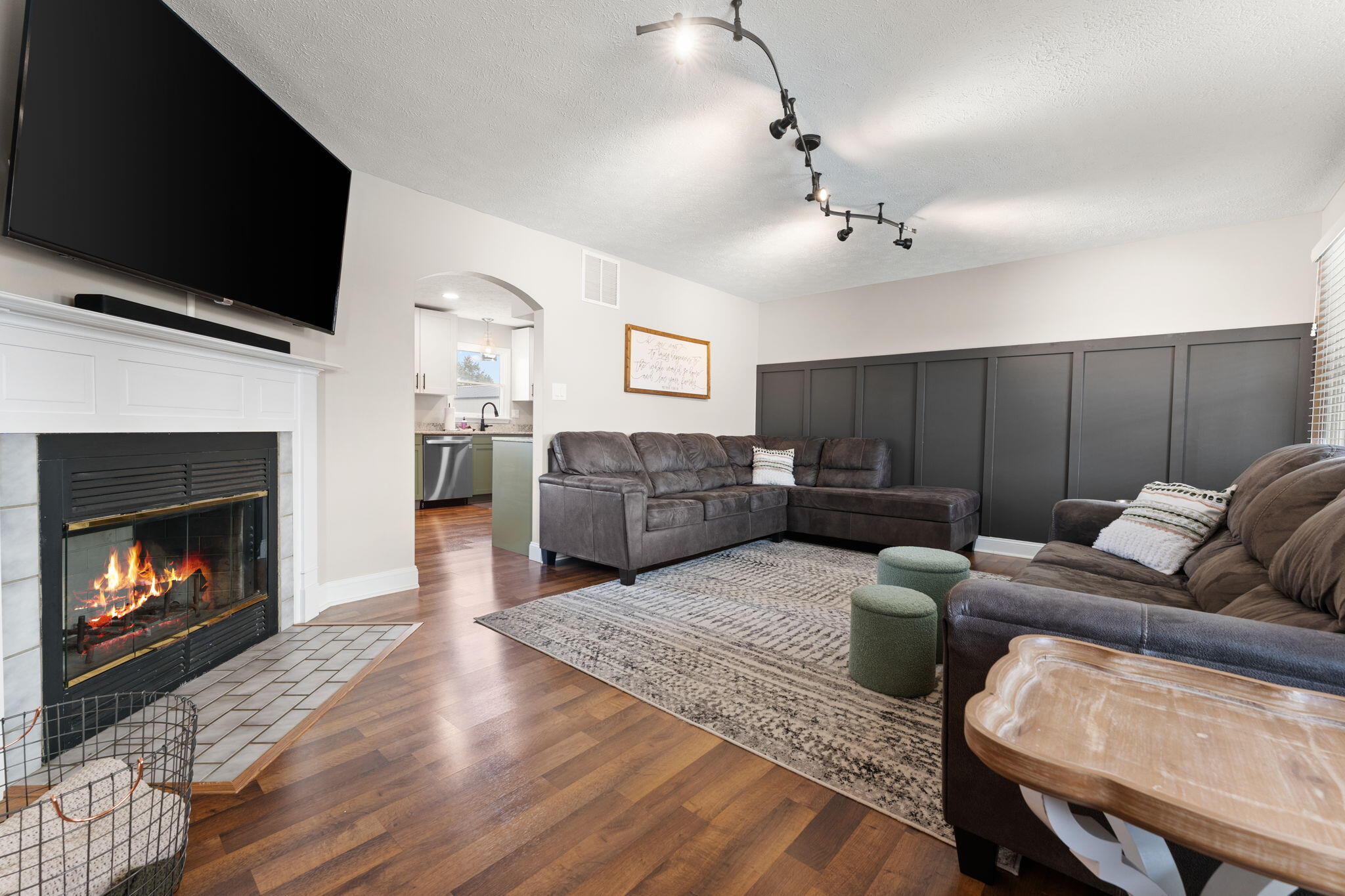 897 Jane Avenue Chesterton, IN 46304 - Photo 6 of 40 a living room with furniture fireplace and flat screen tv