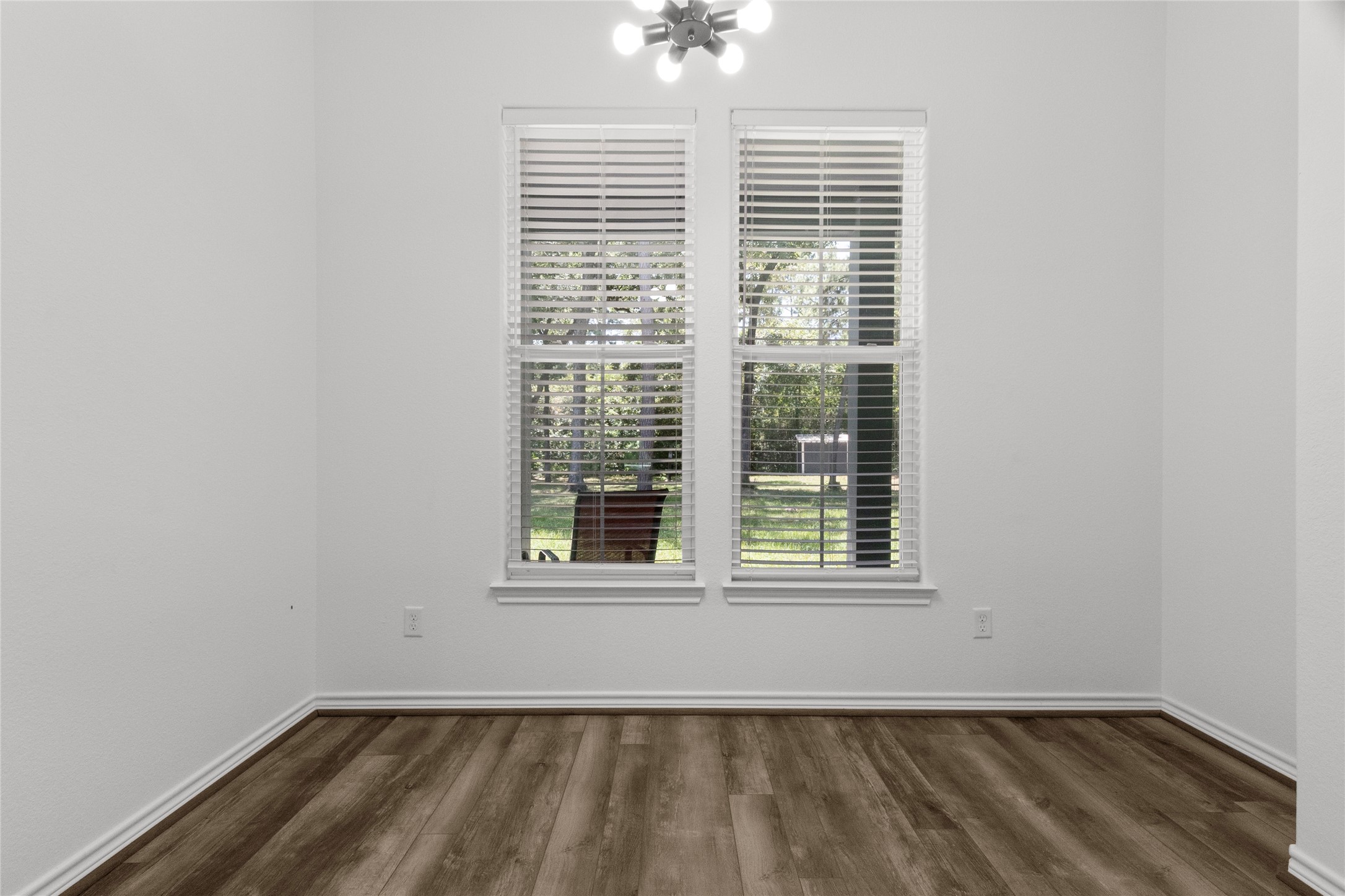 16735 Azalea Lane Plantersville, TX 77363 - Photo 13 of 44 a view of an empty room with a window