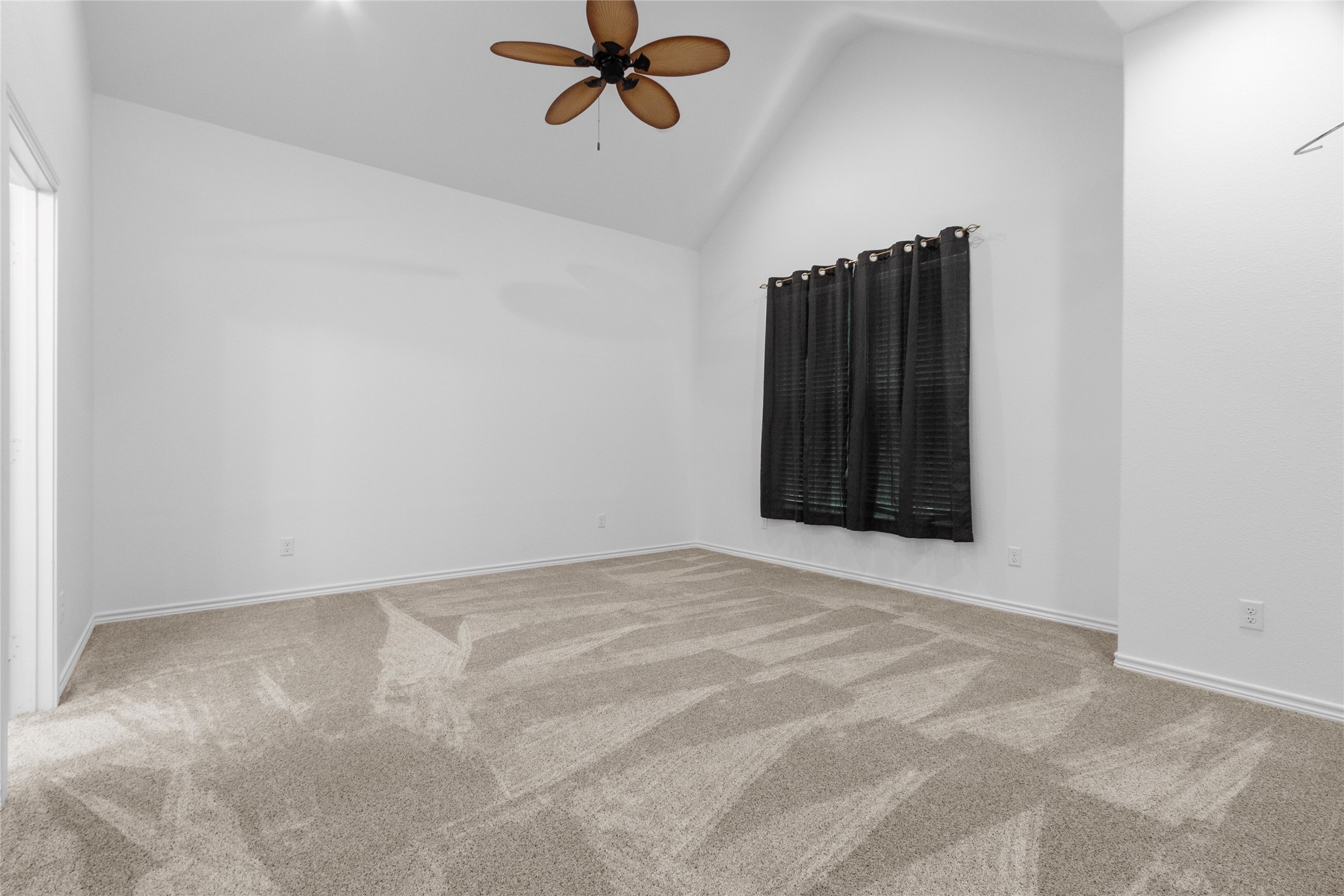 16735 Azalea Lane Plantersville, TX 77363 - Photo 17 of 44 a view of an empty room with a window