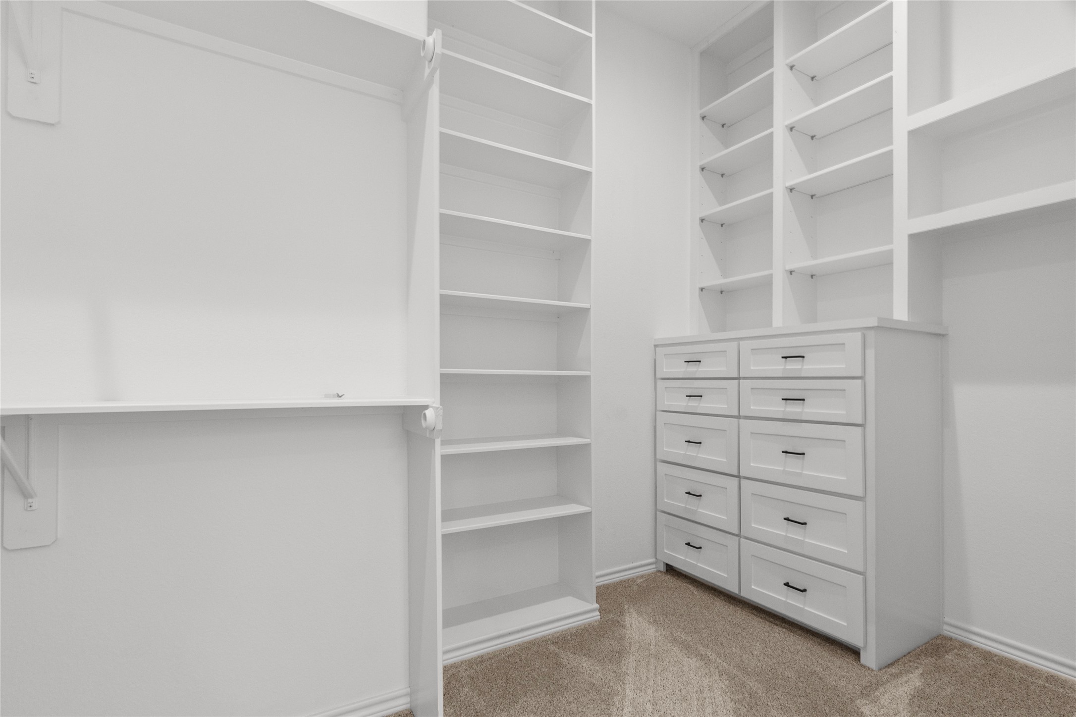 16735 Azalea Lane Plantersville, TX 77363 - Photo 22 of 44 a view of an empty walk in closet