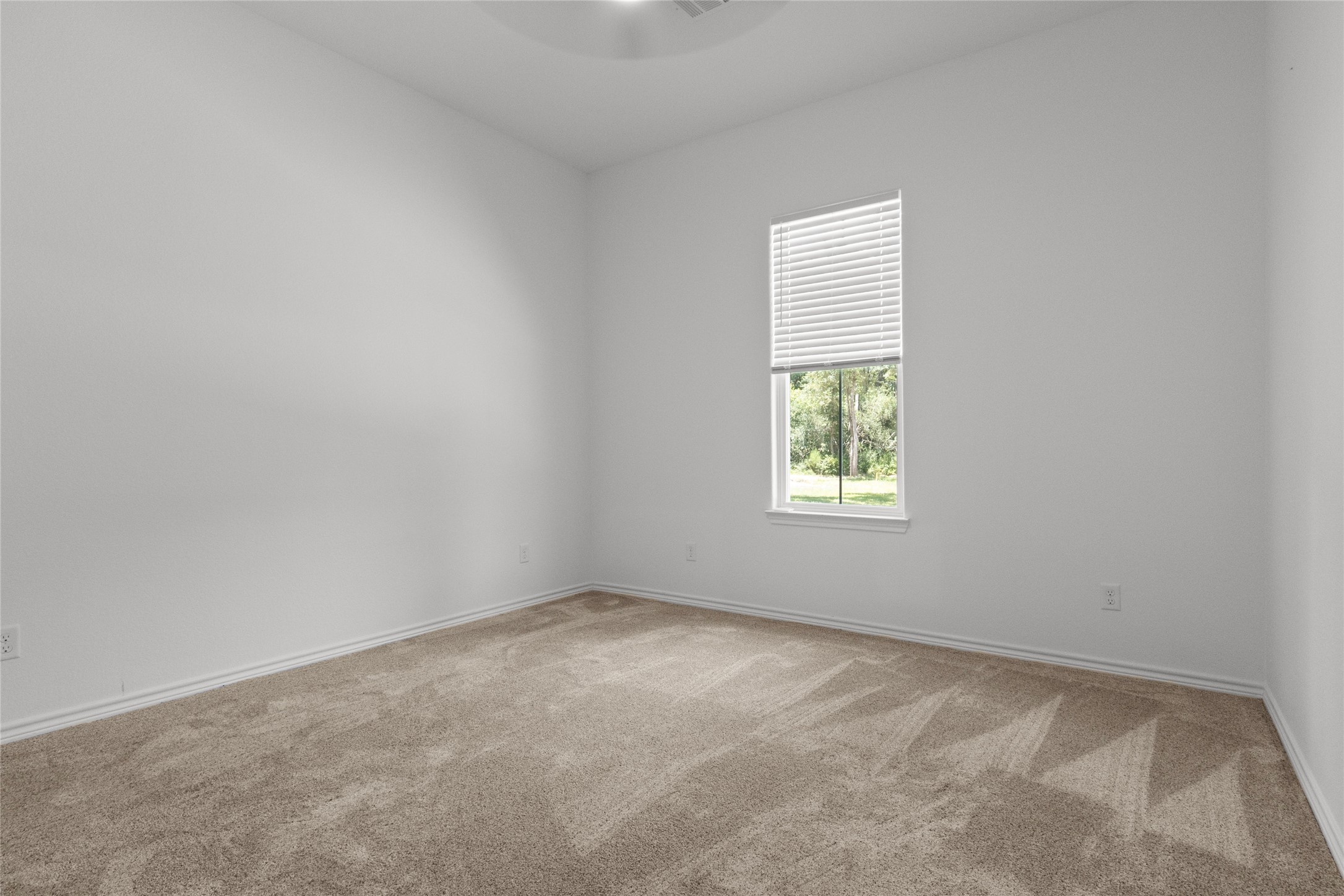 16735 Azalea Lane Plantersville, TX 77363 - Photo 25 of 44 an empty room with a window
