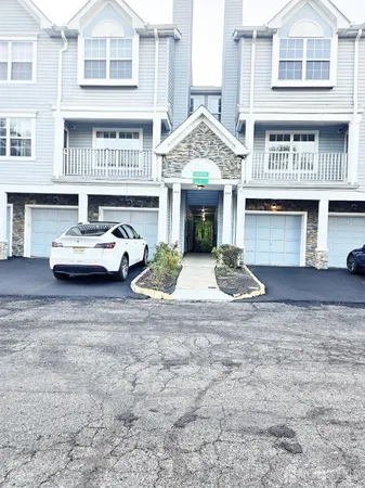 a front view of a house with yard