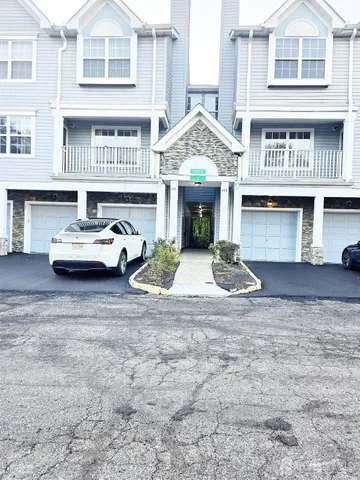 a front view of a house with yard