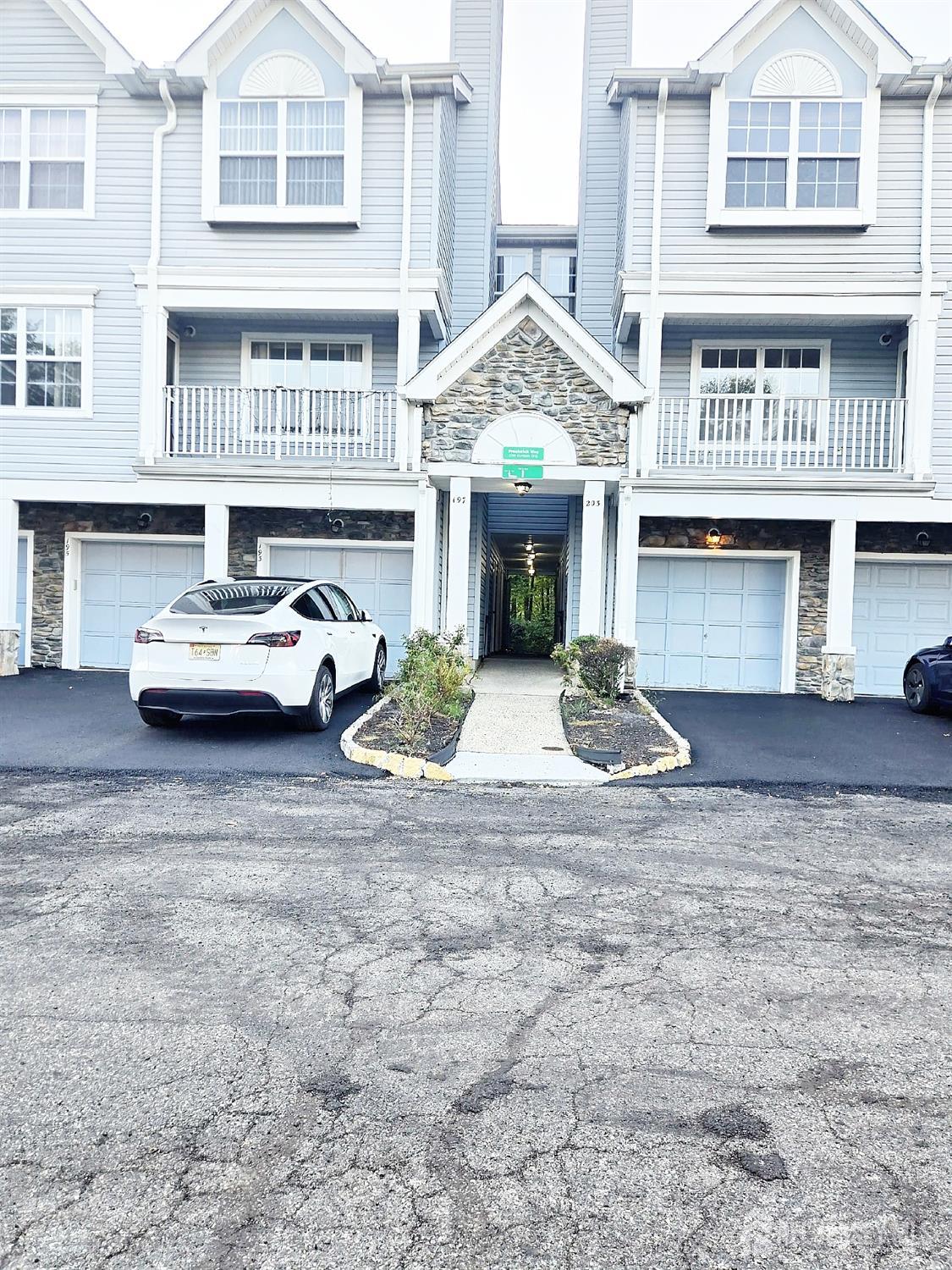 a front view of a house with yard