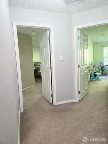 a bed room with a bed and a tv