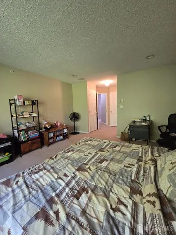 a kitchen with granite countertop a stove and a sink