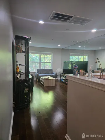 a kitchen with granite countertop a stove and a sink