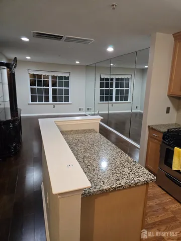 a bathroom with a bathtub a sink and a mirror