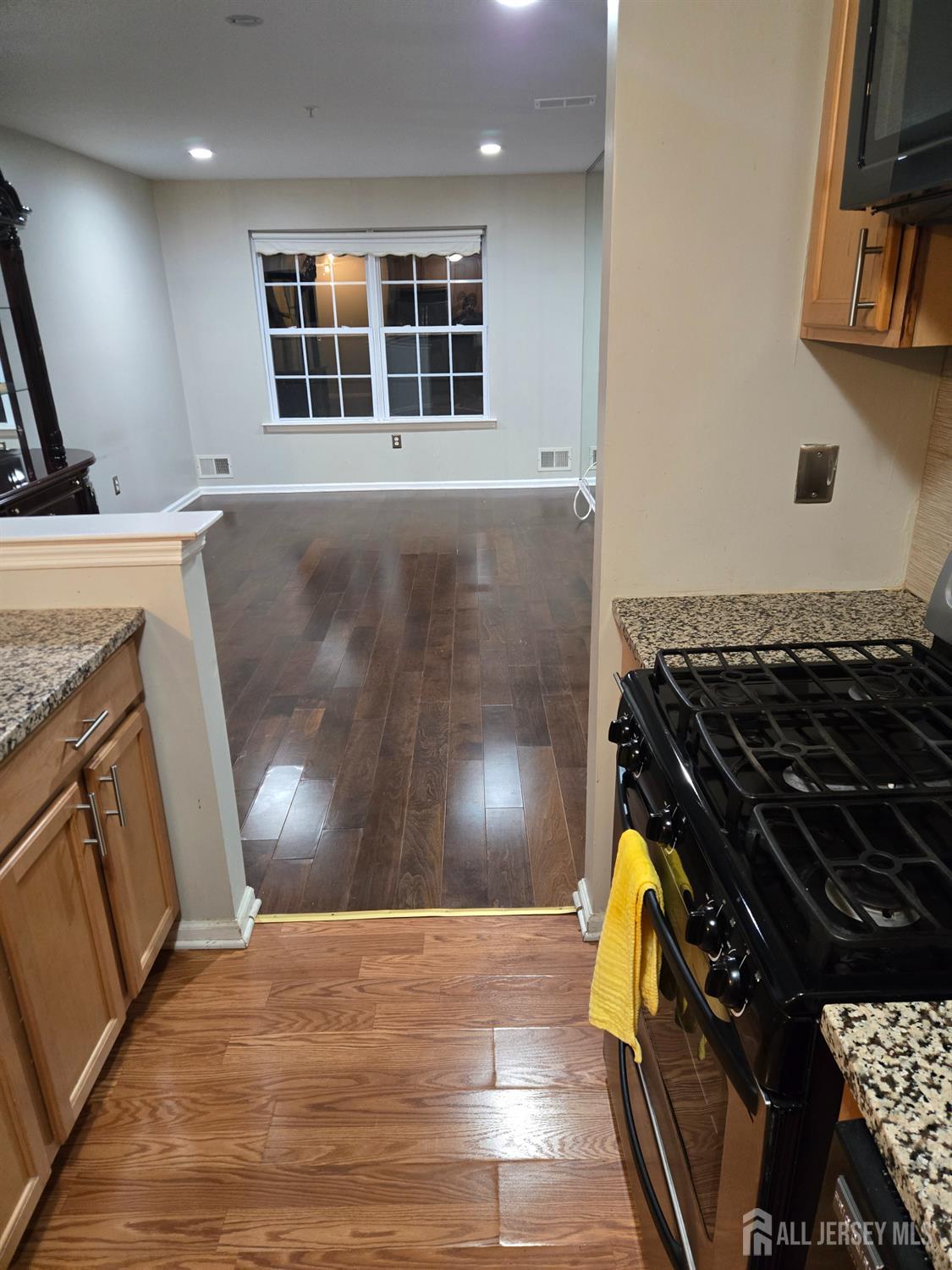 201 Prestwick Way Edison, NJ 08820 - Photo 19 of 21 a kitchen with granite countertop a stove and a sink