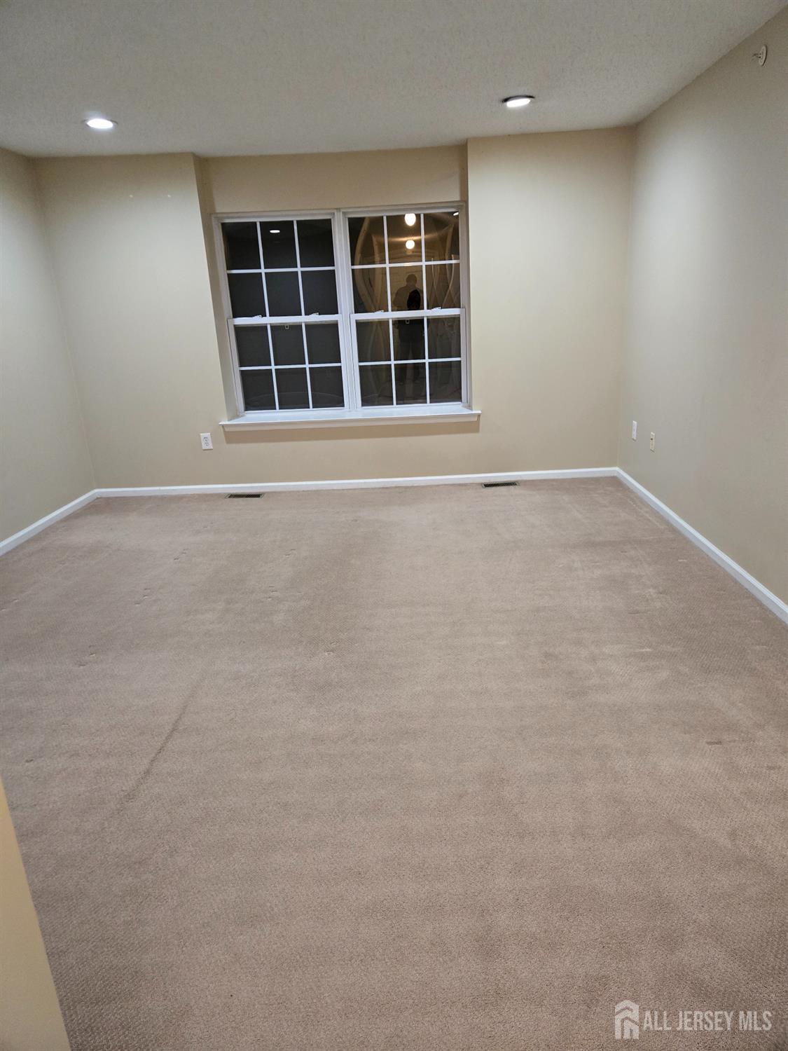 201 Prestwick Way Edison, NJ 08820 - Photo 20 of 21 a view of an empty room with a window