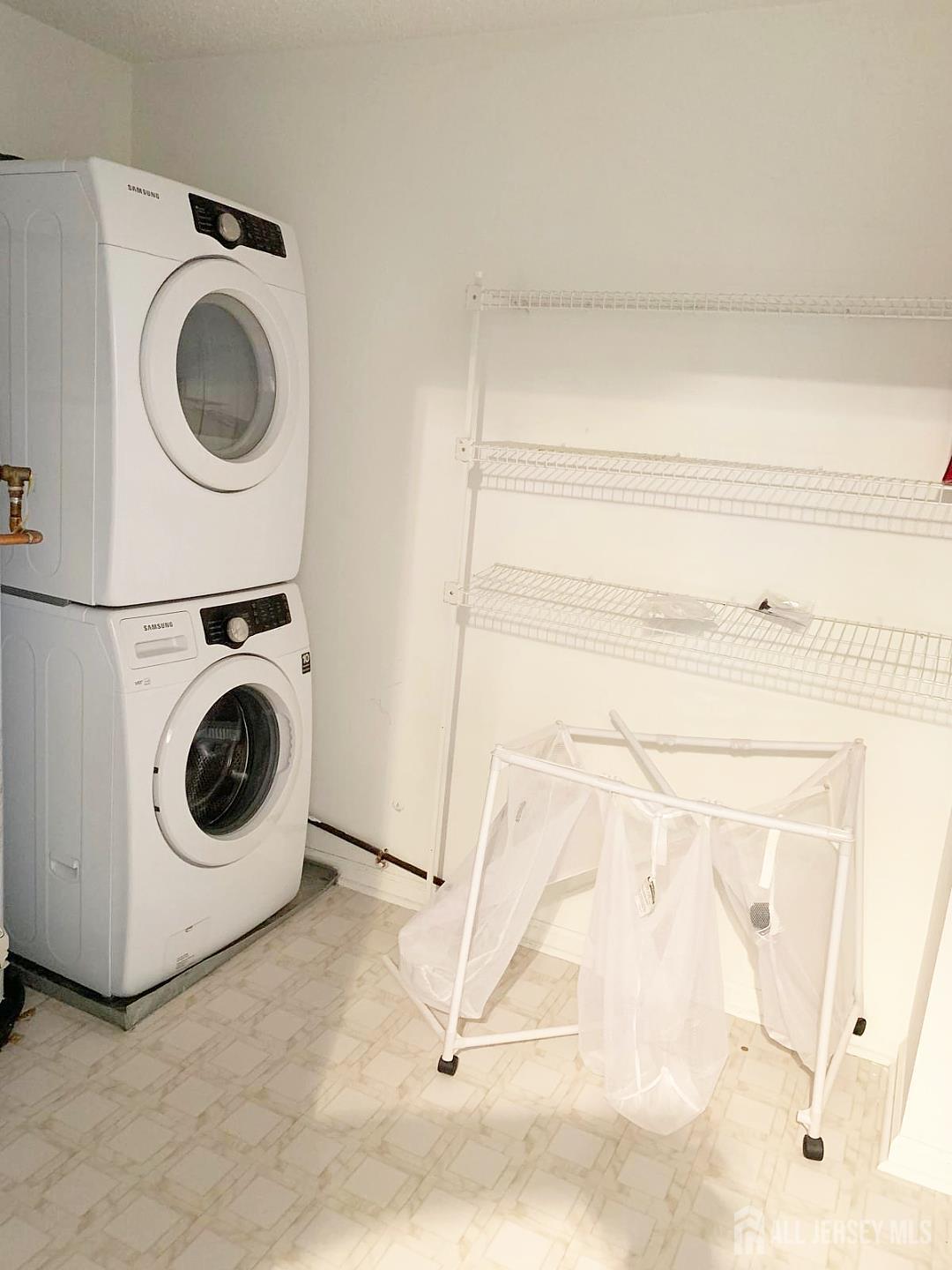 201 Prestwick Way Edison, NJ 08820 - Photo 6 of 21 a utility room with dryer and washer