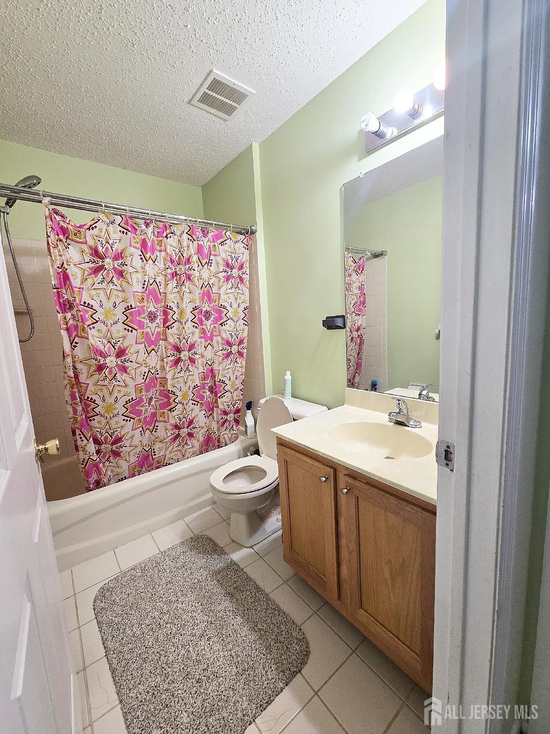 201 Prestwick Way Edison, NJ 08820 - Photo 10 of 21 a bathroom with a sink and mirror