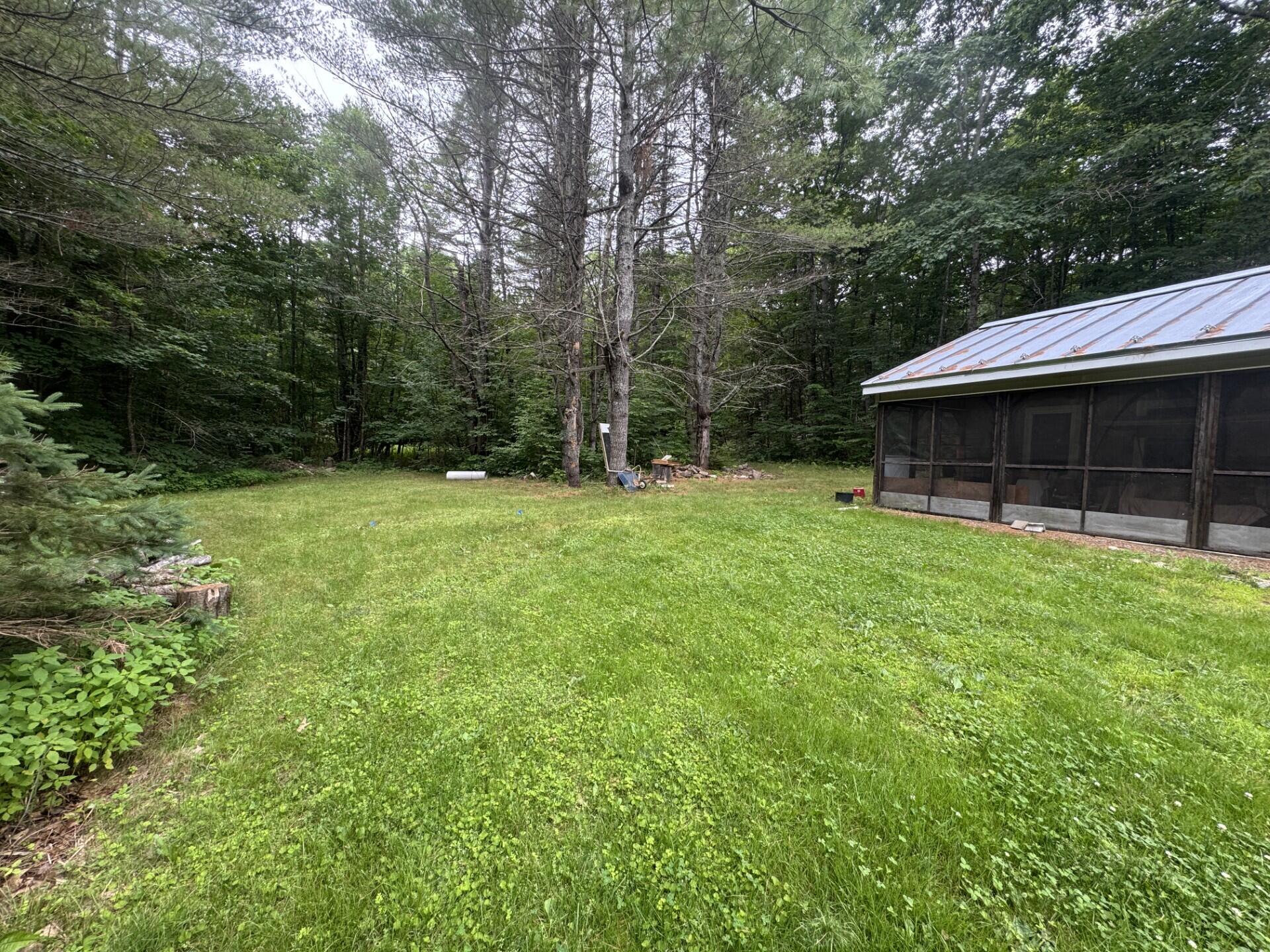 569 Stevens Road Unity, ME 04988 - Photo 6 of 23 Screen porch and yard