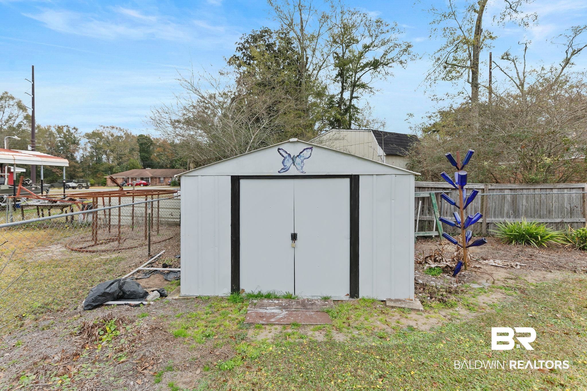 519 Juniper Place Drive Foley, AL 36535 - Photo 37 of 47 View of shed featuring a fenced backyard